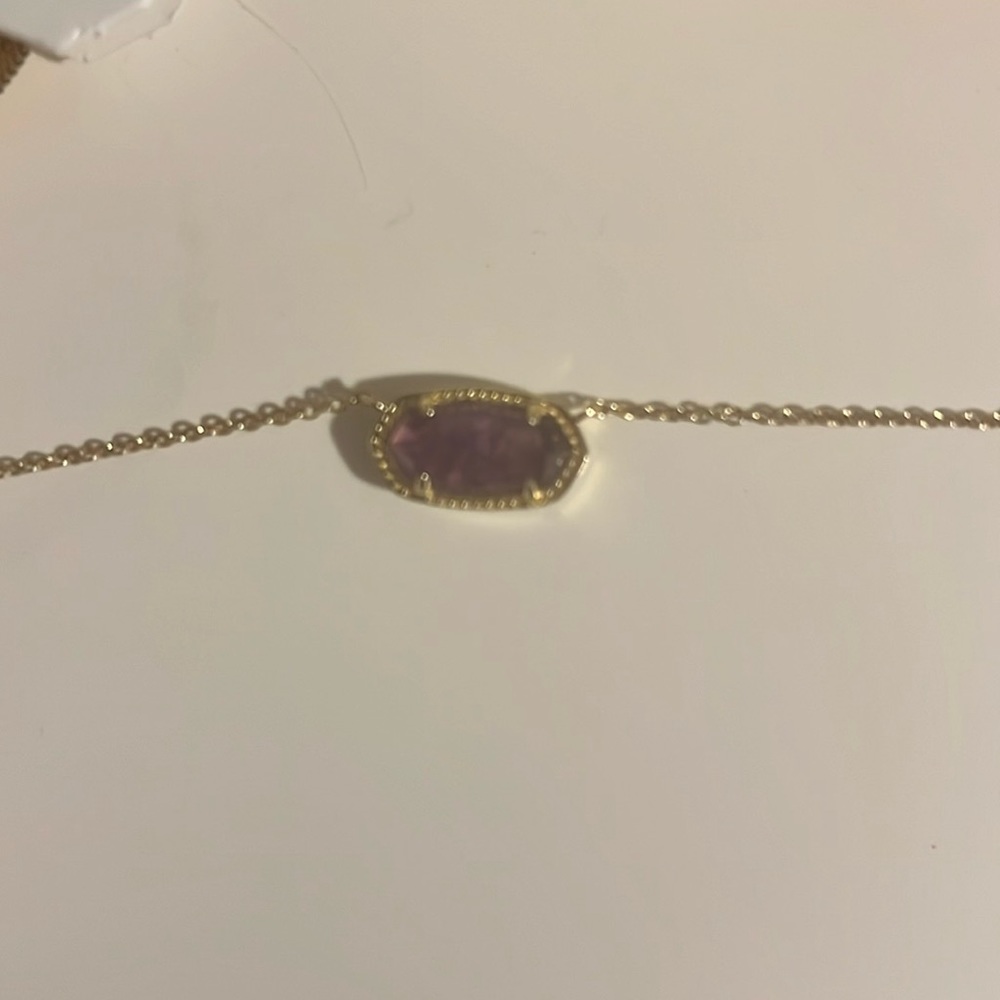 purple kendra scott necklace